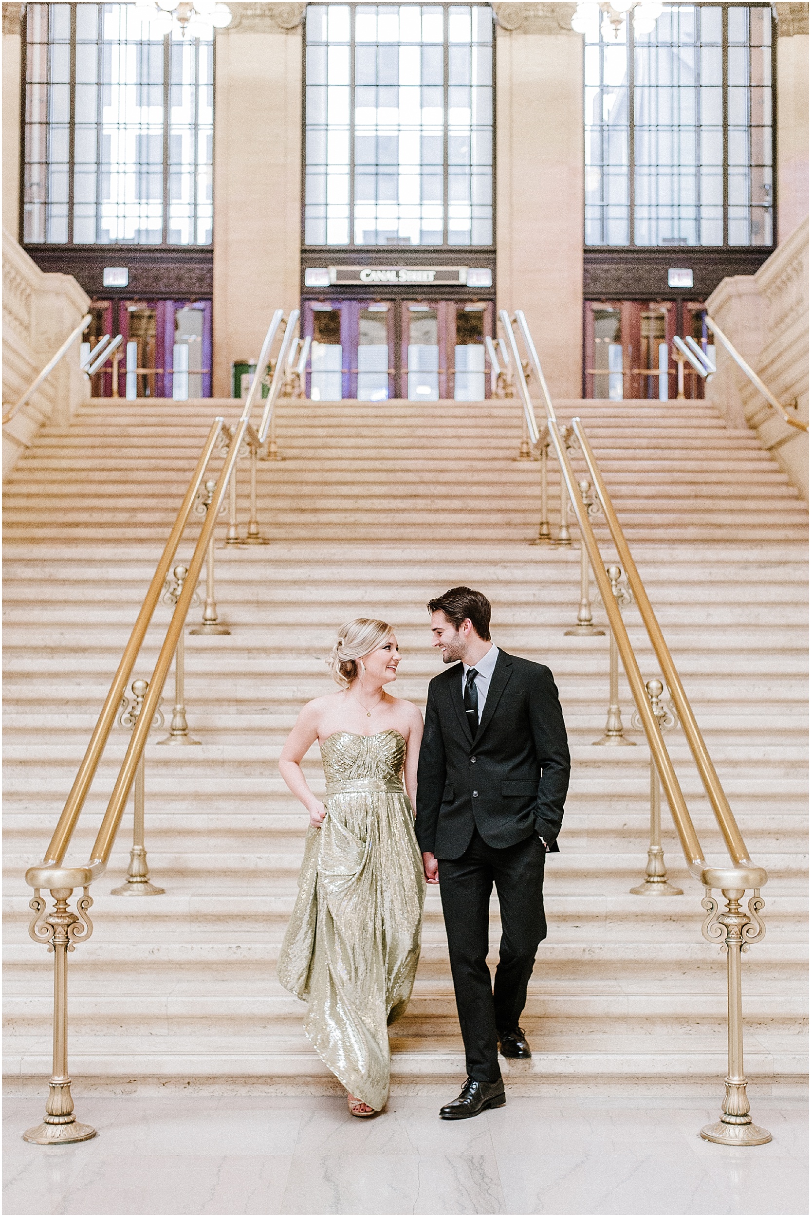 couple walking down stairs at chicago union station