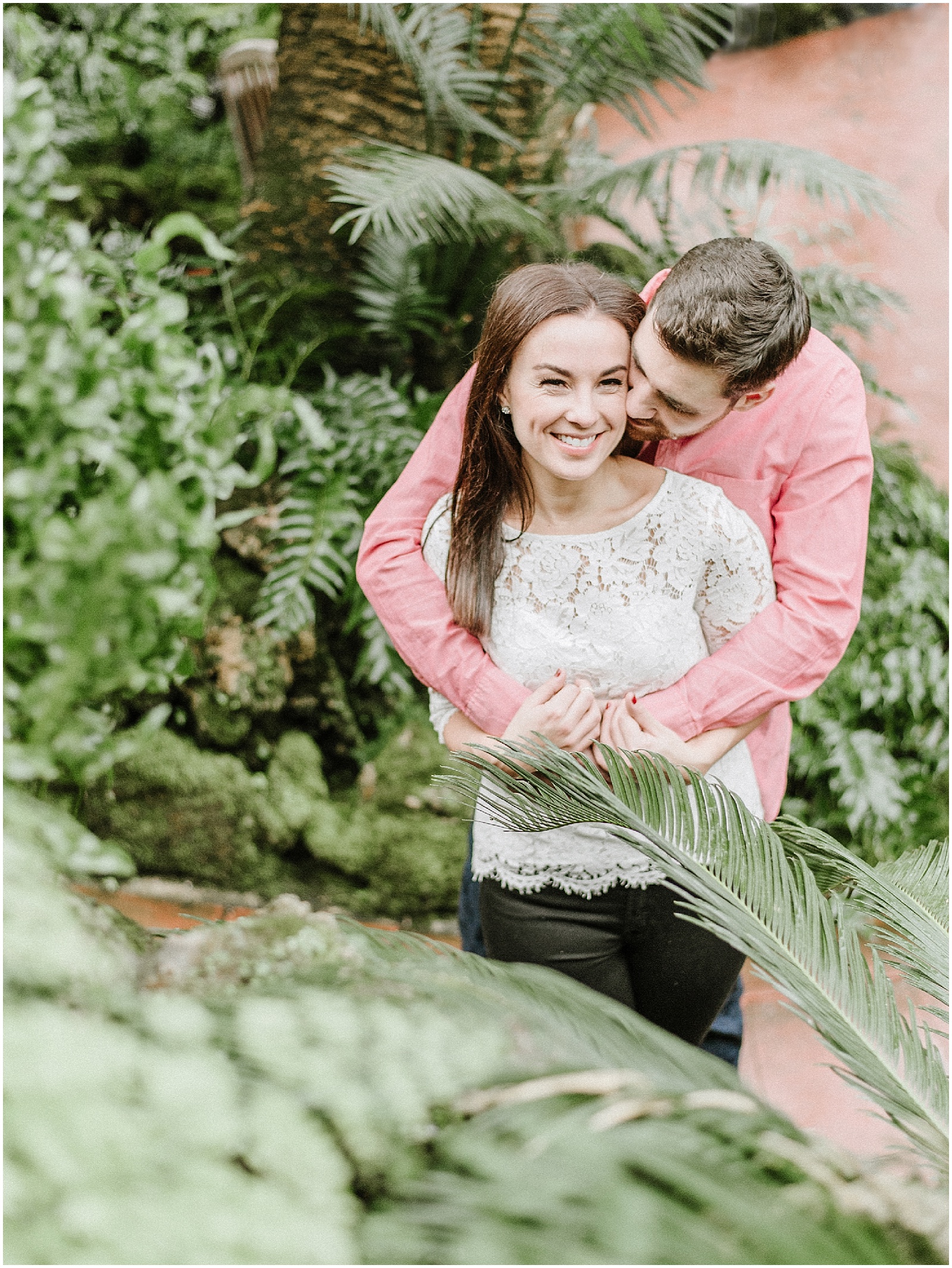 Engagement photos in a greenhouse