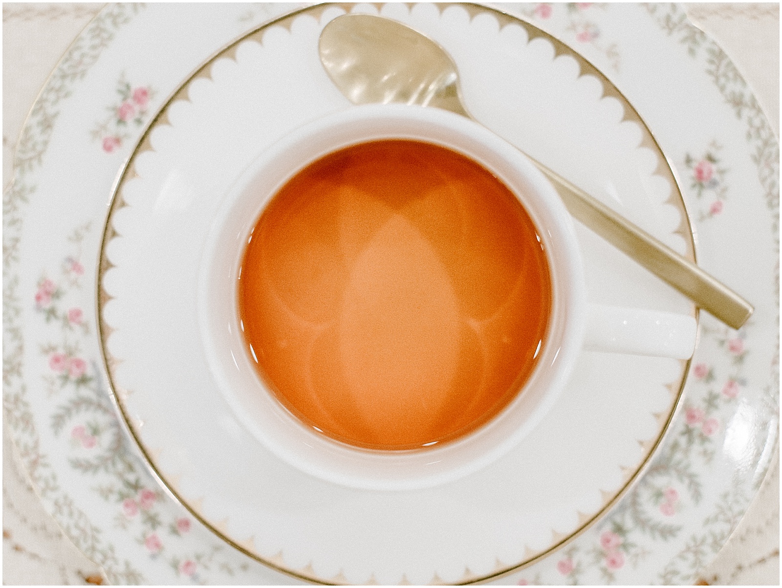 cup of tea with mismatched plates