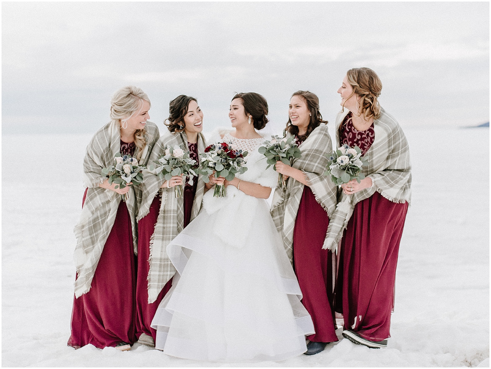 winter bridesmaid inspiration burgundy gowns with grey flannel wraps