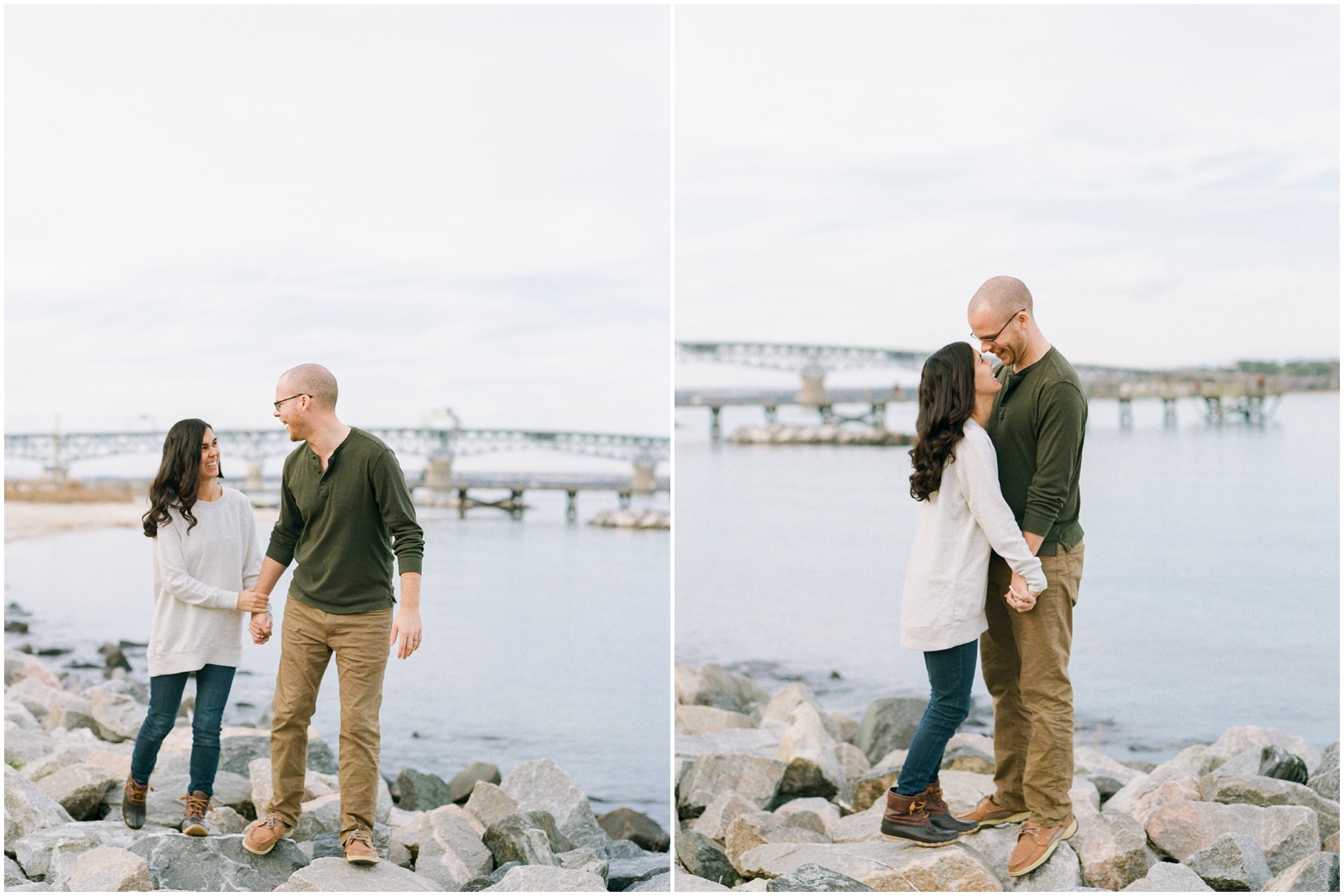 couple walking along rocks during cozy winter anniversary session