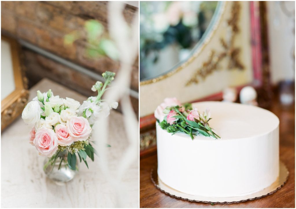 simple white wedding cake with floral decor