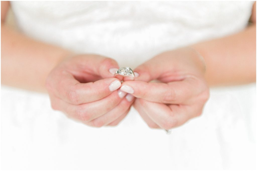 bride holding heirloom ring