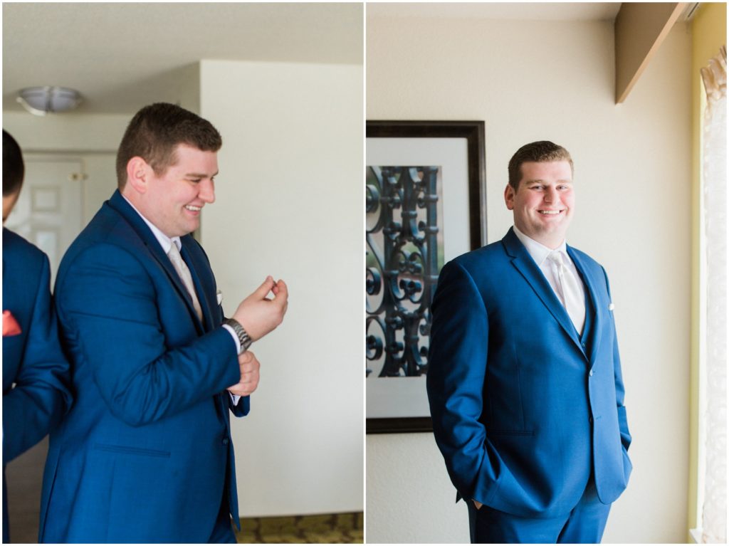 groom wearing navy blue suit