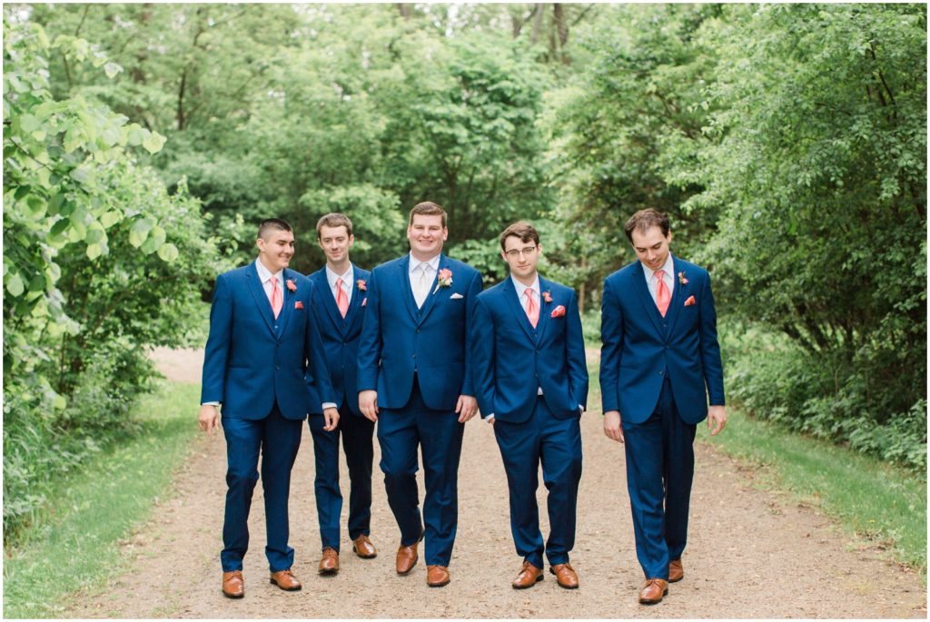navy and coral groomsmen outfits