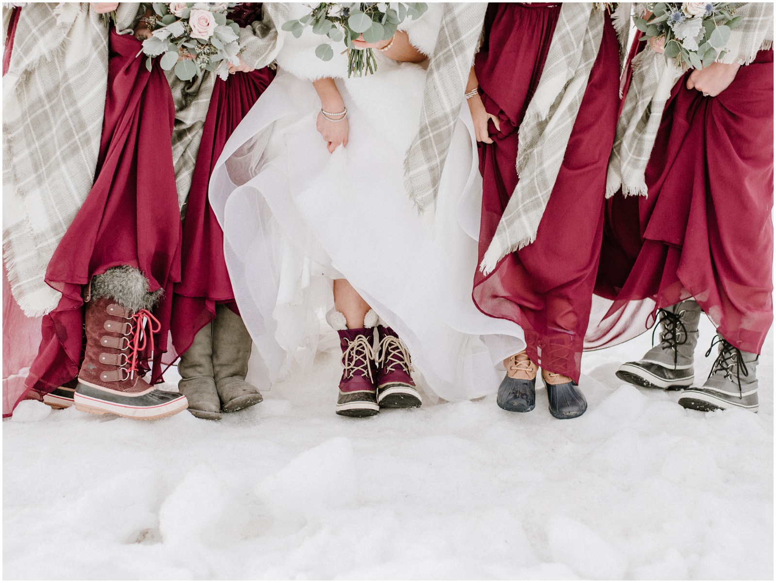 bridesmaids wearing snow boots